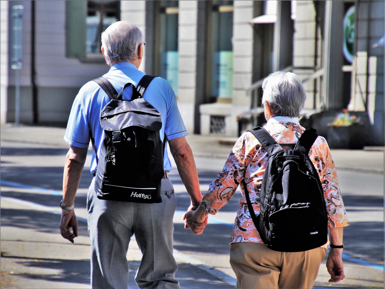 Senior couple walking hand in hand